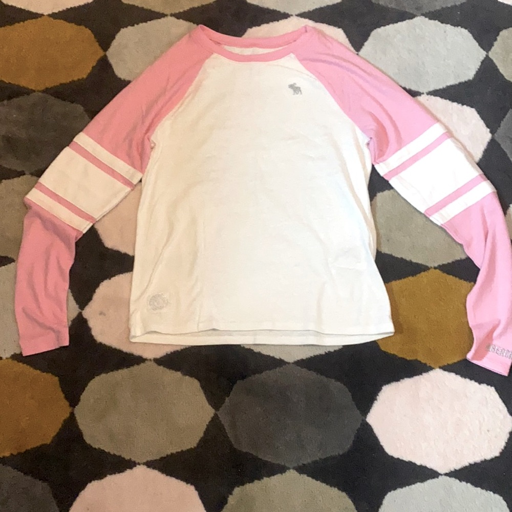 pink and white Abercrombie kids long sleeve shirt